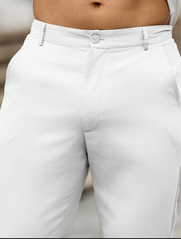 Manfinity Homme Pantalones casuales minimalistas de unicolor con botones y bolsillo para hombres, otoño