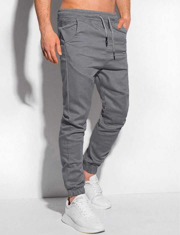 Manfinity Homme Pantalones jogger para hombre con bolsillos parche y puños elásticos, otoño