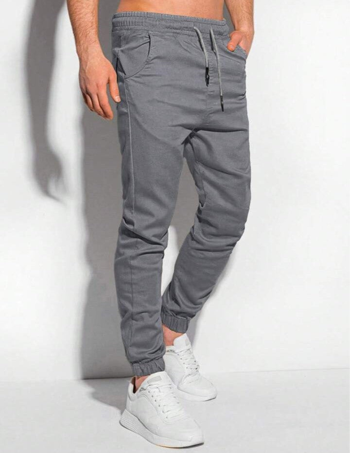 Manfinity Homme Pantalones jogger para hombre con bolsillos parche y puños elásticos, otoño
