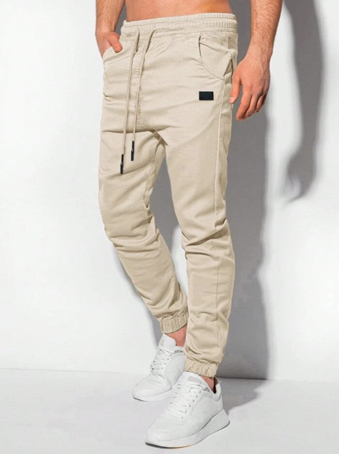 Manfinity Homme Pantalones jogger para hombre con bolsillos parche y puños elásticos, otoño