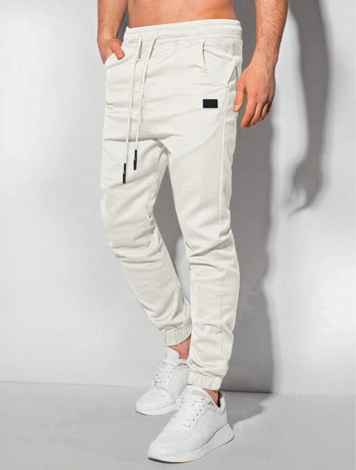 Manfinity Homme Pantalones jogger para hombre con bolsillos parche y puños elásticos, otoño