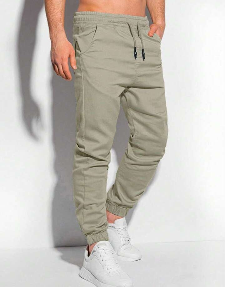 Manfinity Homme Pantalones jogger para hombre con bolsillos parche y puños elásticos, otoño