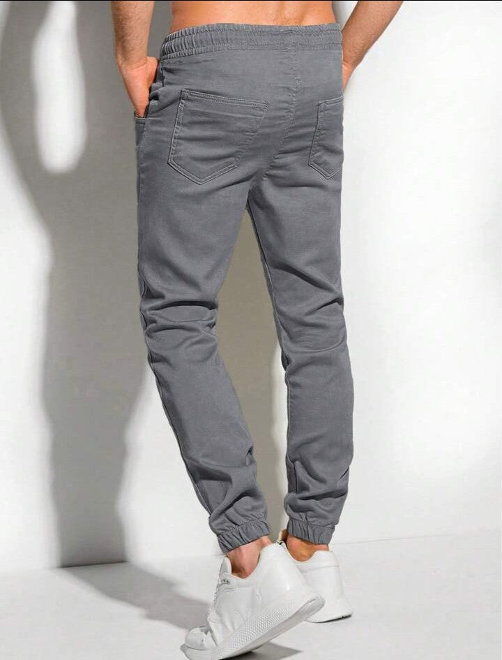 Manfinity Homme Pantalones jogger para hombre con bolsillos parche y puños elásticos, otoño